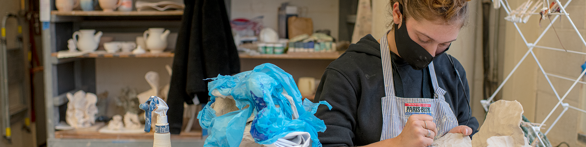 student in a ceramic glass