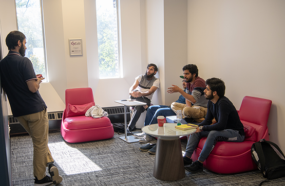 students talking in a common room